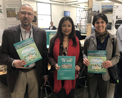 NIFA’s Ali Mohamed, division director, division of environmental systems, Gyami Shrestha with the Carbon Cycle Interagency Working Group, and NIFA’s Nancy Cavallaro, national program leader, division of global climate change celebrate Earth Day at the USDA’s South Building cafeteria.
